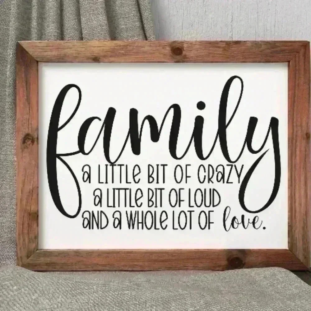 Family canvas sign framed bought from Etsy. White with black writing.